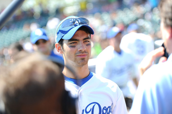 Joe+Jonas+Jonas+Brothers+Encourage+Fans+X+XBNGHm0ppigl - Jonas Brothers Encourage Fans to X the TXT on Road Dogs Softball Tour