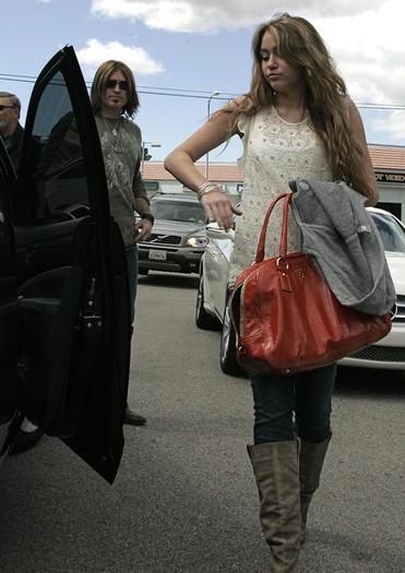  - x Miley Cyrus And Family Leaving The Studio Cafe 2010