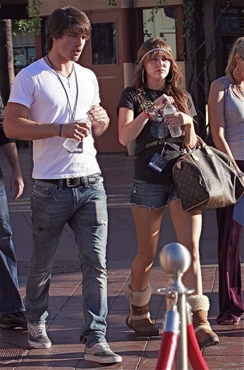  - x Miley Cyrus And Justin Gaston In Universal City 2010