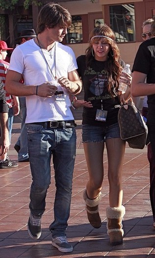  - x Miley Cyrus And Justin Gaston In Universal City 2010