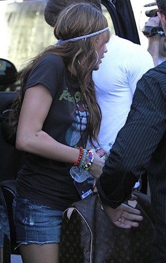  - x Miley Cyrus And Justin Gaston In Universal City 2010