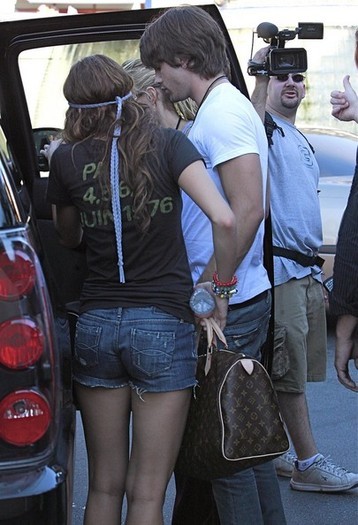  - x Miley Cyrus And Justin Gaston In Universal City 2010