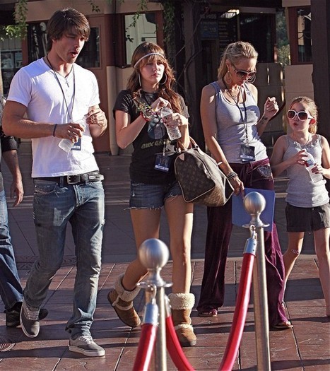  - x Miley Cyrus And Justin Gaston In Universal City 2010