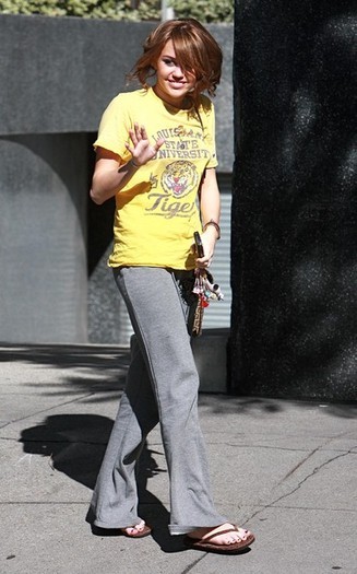  - x Miley Cyrus Arriving Downtown 2009