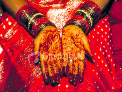 istockphoto_376974-sikh-bride-s-hands-covered-with-hena - Henna