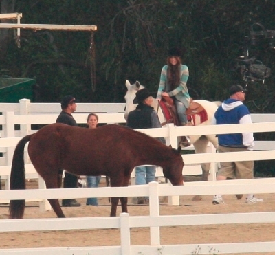 normal_25355_Preppie_-_Miley_Cyrus_riding_a_horse_in_Malibu_-_Feb__1_2010_6234_122_1167lo - Filming Scenes For Hannah mOntana Forever In Mailbu