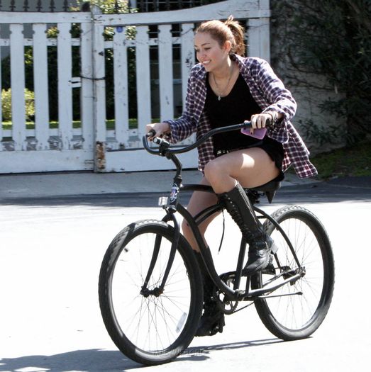 1 - Riding her bike in Toluca Lake - March 5 2010