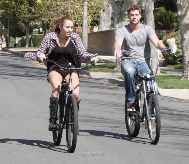 13 - Riding her bike in Toluca Lake - March 5 2010