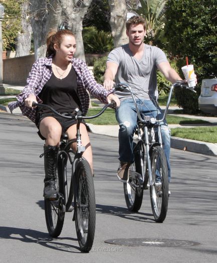 16 - Riding her bike in Toluca Lake - March 5 2010