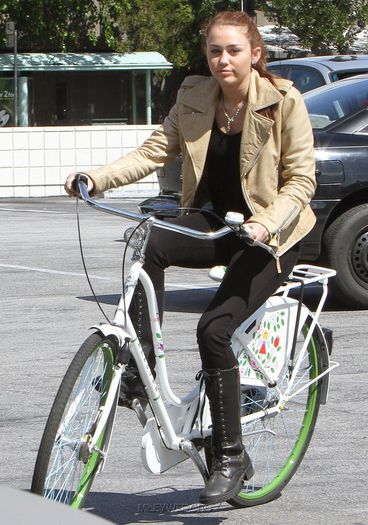 12 - Riding her Bike in Toluca Lake - March 7 2010