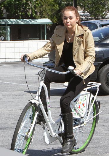 13 - Riding her Bike in Toluca Lake - March 7 2010