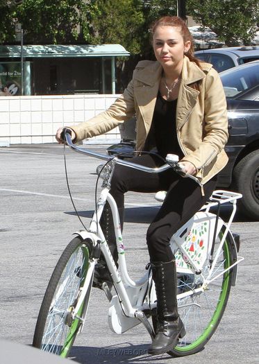 15 - Riding her Bike in Toluca Lake - March 7 2010