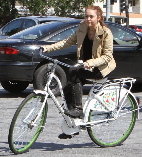 16 - Riding her Bike in Toluca Lake - March 7 2010