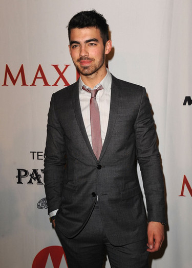 Joe+Jonas+Maxim+Party+Powered+Motorola+Xoom+9-o5rhojIRLl