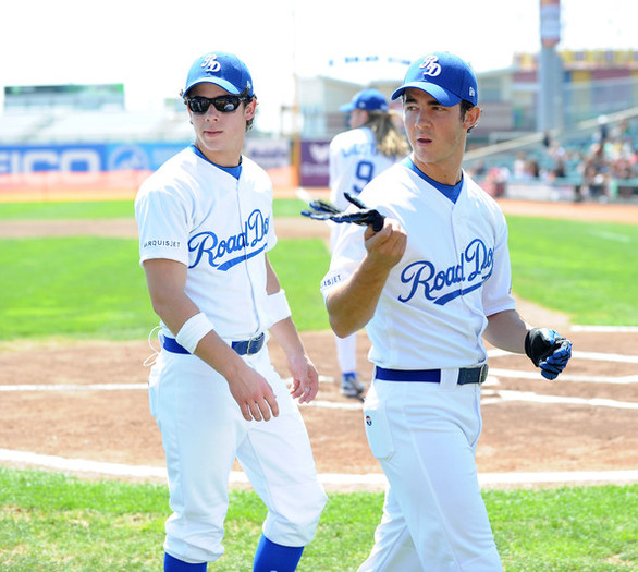 Nick Jonas and Kevin Jonas - Jonas Brothers Encourage Fans to X the TXT on Road Dogs Softball Tour