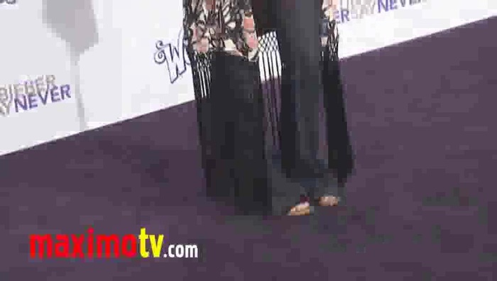 MILEY CYRUS at  \'Never Say Never\' Premiere in Los Angeles 180