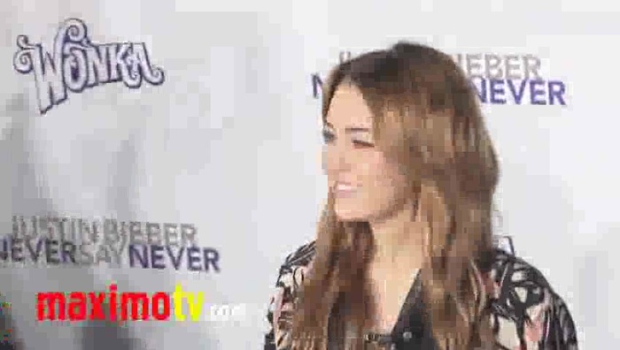 MILEY CYRUS at  \'Never Say Never\' Premiere in Los Angeles 407