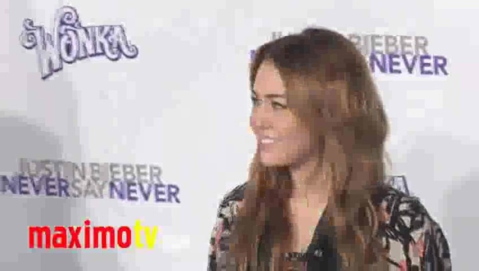 MILEY CYRUS at  \'Never Say Never\' Premiere in Los Angeles 408