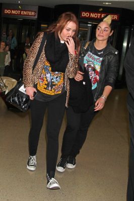  - x Arriving at LAX Airport in Los Angeles - 06th March 2011