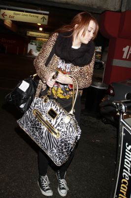  - x Arriving at LAX Airport in Los Angeles - 06th March 2011