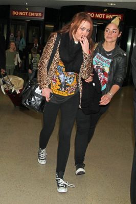  - x Arriving at LAX Airport in Los Angeles - 06th March 2011