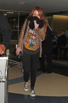  - x Arriving at LAX Airport in Los Angeles - 06th March 2011