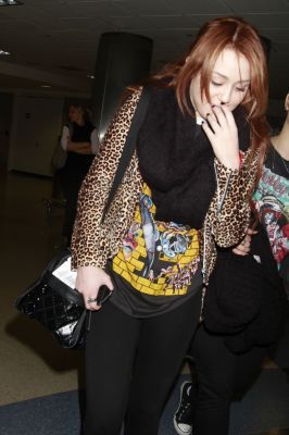 - x Arriving at LAX Airport in Los Angeles - 06th March 2011