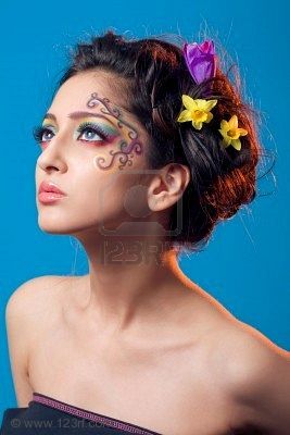 7563907-portrait-of-a-young-girl-with-fantasy-makeup
