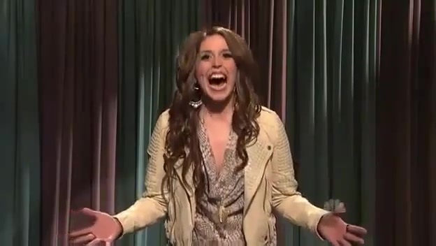 Miley Cyrus  as Justin Bieber  SNL 0439 - 0-0 Miley Cyrus as Justin Bieber  SNL