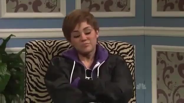 Miley Cyrus  as Justin Bieber  SNL 0803 - 0-0 Miley Cyrus as Justin Bieber  SNL