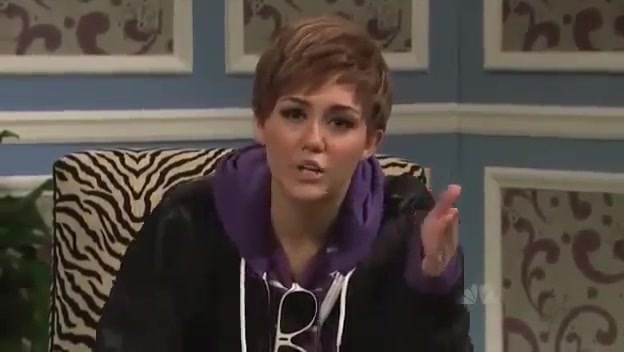 Miley Cyrus  as Justin Bieber  SNL 0931 - 0-0 Miley Cyrus as Justin Bieber  SNL