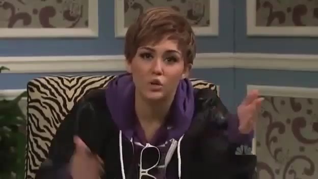 Miley Cyrus  as Justin Bieber  SNL 0932 - 0-0 Miley Cyrus as Justin Bieber  SNL