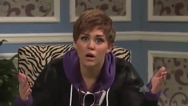 Miley Cyrus  as Justin Bieber  SNL 0938 - 0-0 Miley Cyrus as Justin Bieber  SNL