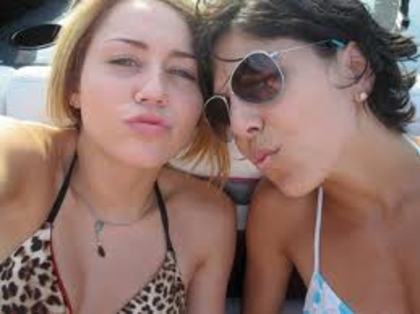 images (7) - Poze rare cu Miley