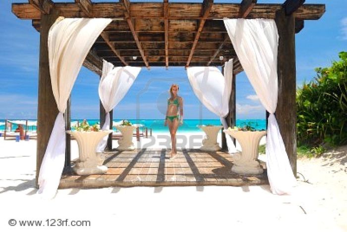 4717957-beautiful-caribbean-beach-with-pergola-in-dominican-republic