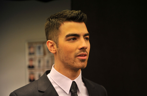 Joe Jonas Musician Joe Jonas backstage at the Calvin Klein Men\'s Collection Fall 2011 fashion show 