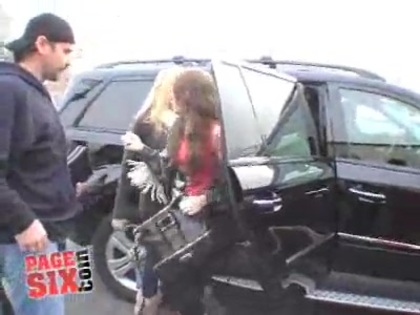 RARE VIDEO. MILEY CYRUS GETTING ON A HELICOPTER 035