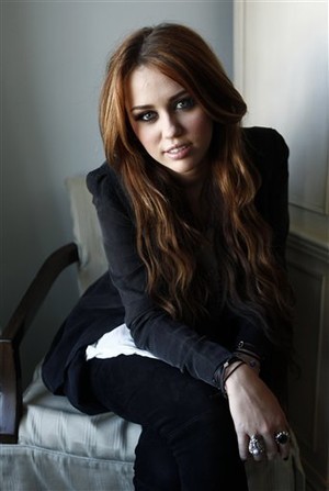 Miley-in-black-dress-miley-cyrus-21133477-300-447