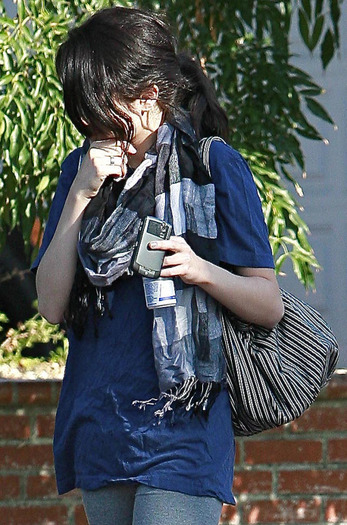 53939_Celebutopia-Selena_Gomez_leaving_her_house_and_drinking_a_Red_Bull-03_122_348lo - Selena Gomez leaving her house and drinking a Red Bull  Los Angeles October 5