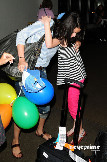 selena_eyeprime_07 - Selena Gomez arrives at LAX  Jul 22  2010
