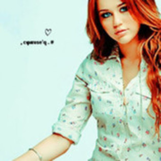 31307587_ADOUQSXKD - Miley Cyrus glittery