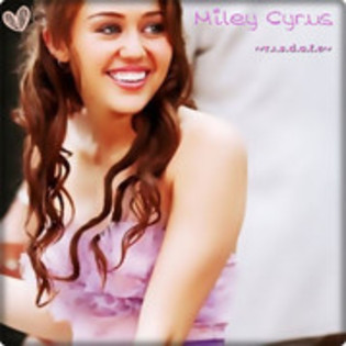 33872425_OJHLDBJRO - Miley Cyrus glittery