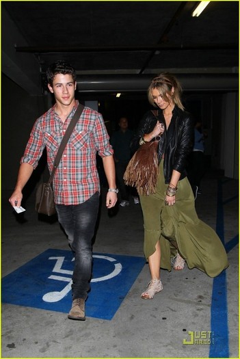 Nick-Jonas-Movies-with-Delta-Goodrem-05-15-2011-nick-jonas-22085962-817-1222 - Holding Hands -Delta GoodDrem