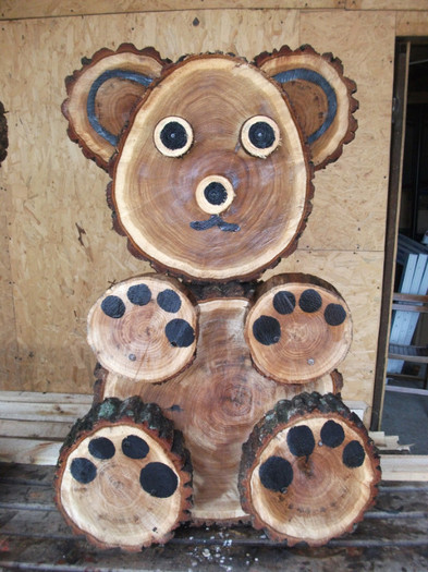 100 LEI - sculptura cu drujba