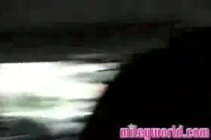 MileyWorld - Miley in Car 098