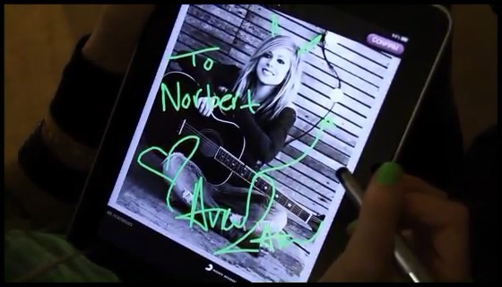 bscap0277 - Avril signing autograph on an ipad