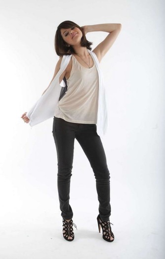 Selena Gomez wears pretty white tank top and black jeans (5) - disney actress 3