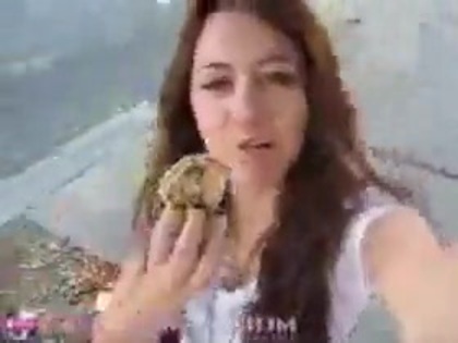   (238) - Miley Cyrus filming herself eating a big cookie - Captures