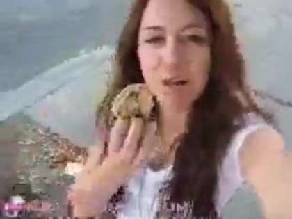   (240) - Miley Cyrus filming herself eating a big cookie - Captures