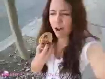   (268) - Miley Cyrus filming herself eating a big cookie - Captures